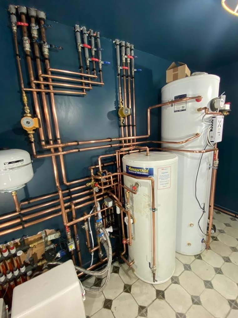 MYCONOS plumbing expert working on residential systems